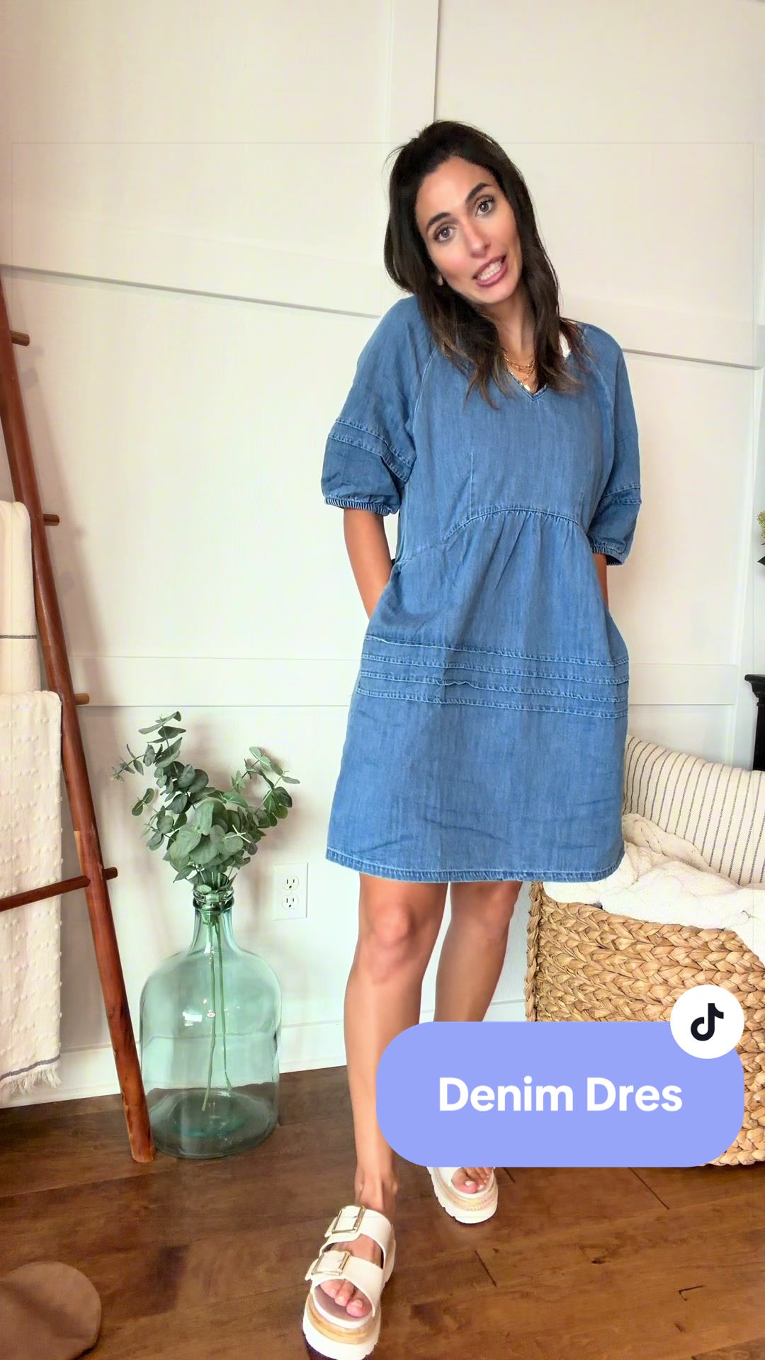 Lightweight denim dress 💙✨ The perfect casual chic summer dress! Soft chambray like dress, lightweight denim dress, babydoll dress, V-neck dress, pleated detail dress, tie back dress, puff sleeve dress, modest fashion, everyday dress, teacher outfit, brunch outfit, vacation dress, comfortable summer outfit, casual elegance, boutique style fashion, flattering loose fit dress, effortless style for women. This lightweight denim dress is everything! 😍💙 The sweet pleated details, flattering V-neckline, tie-back detail, and breezy lightweight fabric make it perfect for summer, travel, brunch dates, church, work, or everyday wear. Comfortable and stylish is always a win! ✨