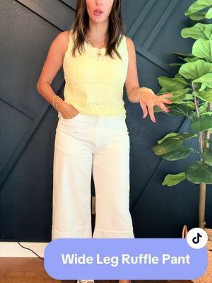 White ruffle hem pants 🤍✨ The perfect statement pant for spring and summer! Wide leg pants, ruffle hem trousers, white flowy pants, resort wear, vacation outfit, beach vacation style, coastal grandmother fashion, boho chic outfit, boutique fashion, casual elegant style, high waisted pants, lightweight summer pants, brunch outfit, vacation wardrobe essentials, feminine fashion, trendy women’s clothing. These white ruffle hem pants are absolutely stunning! 🤍✨ The flowy wide-leg fit, feminine ruffle detail, and lightweight fabric make them perfect for vacations, brunch dates, beach trips, spring events, and summer outfits. Such a unique piece that instantly elevates any look!