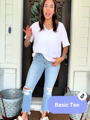 Stay comfortable and stylish with the Imily Bela Women’s Summer V Neck T-Shirt. Designed with a relaxed oversized fit, this lightweight short-sleeve top features a flattering V-neckline, flowy silhouette, and soft breathable fabric perfect for warm-weather wear. The loose, boxy cut pairs effortlessly with denim shorts, leggings, jeans, or casual pants for an easy everyday look. Whether you’re heading to the beach, running errands, traveling, or lounging at home, this versatile summer tunic offers all-day comfort and effortless style. women’s v neck t shirt, oversized t shirt women, loose fit summer top, flowy tunic top, casual short sleeve blouse, lightweight summer shirt, oversized v neck tee, relaxed fit women’s top, breathable summer clothing, trendy oversized shirt, everyday casual top, vacation outfit women, beach cover up top, soft flowy blouse, women’s lounge shirt, boxy fit t shirt, comfy summer outfit, loose tunic for leggings, casual weekend wear, women’s fashion basics, oversized khaki top, lightweight tunic shirt, casual v neck blouse, flowy summer tee, relaxed summer top women