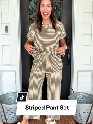 Upgrade your everyday style with this Women’s Striped 2 Piece Matching Set featuring a relaxed short sleeve top and flowy high-waisted wide leg pants. Designed for comfort and effortless fashion, this coordinated outfit combines breathable lightweight fabric with a flattering loose-fit silhouette. The elastic waistband and roomy pockets provide all-day comfort, making this set perfect for travel, vacations, brunch dates, shopping trips, work-from-home days, and casual outings. Wear together for a polished look or mix and match with your favorite wardrobe essentials. ✔ Stylish 2-piece matching outfit ✔ Relaxed short sleeve top design ✔ High-waisted wide leg pants ✔ Comfortable elastic waistband ✔ Functional side pockets ✔ Lightweight breathable fabric ✔ Chic vertical stripe pattern ✔ Perfect for travel and vacations ✔ Easy mix-and-match versatility ✔ Comfortable all-day wear