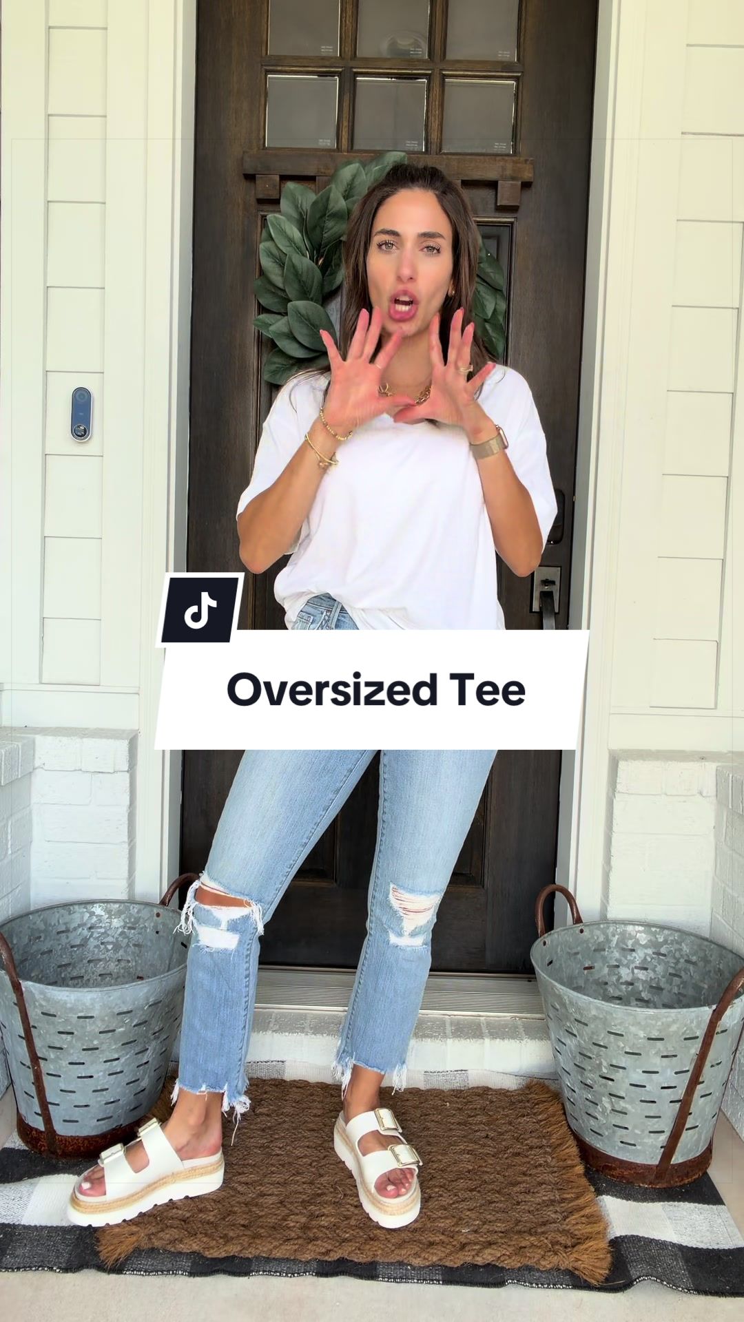 The perfect oversized tee with vneck and raw hem detail!
