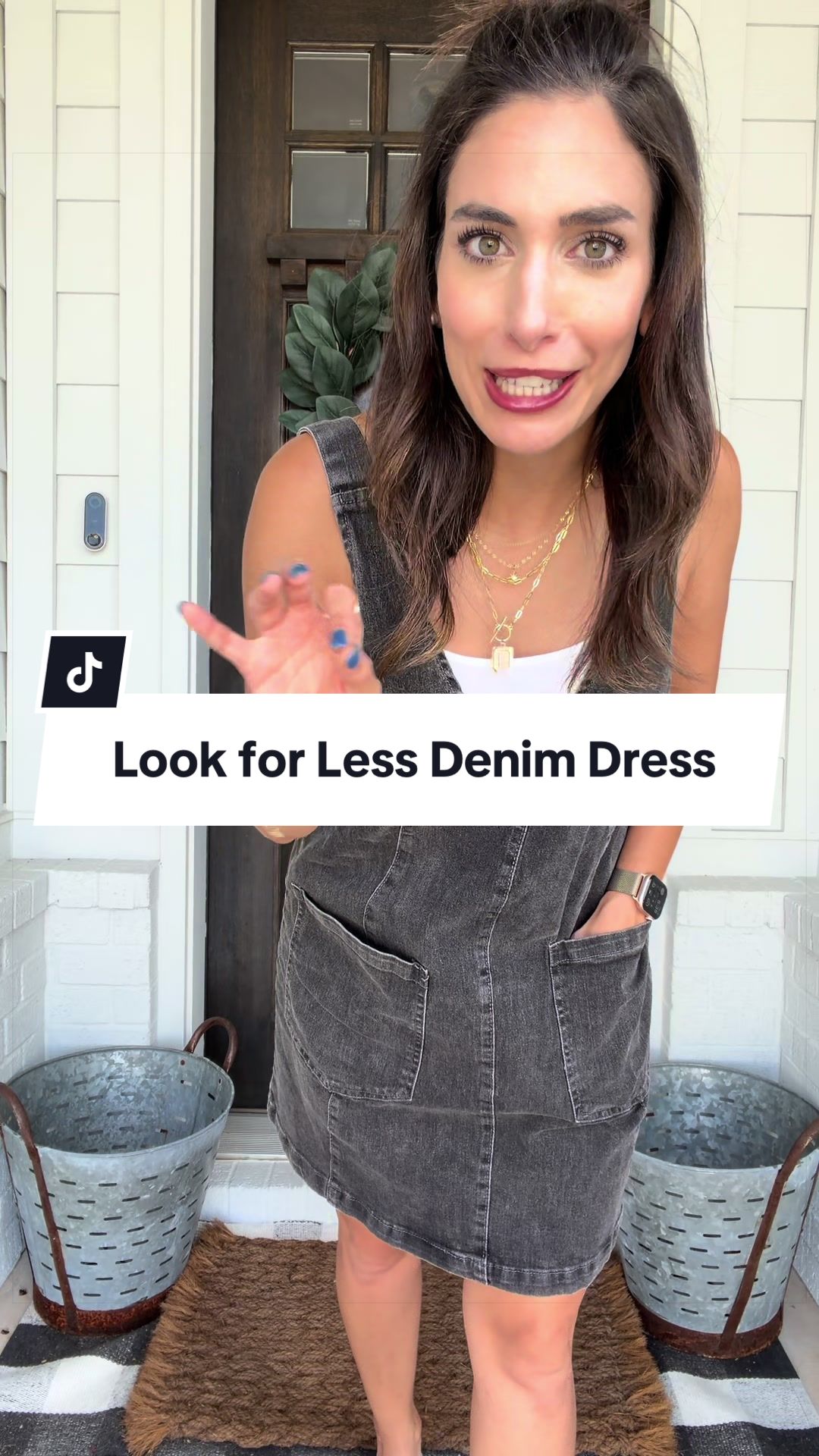 Sleeveless denim dress with the cutest details! She is a look for less!